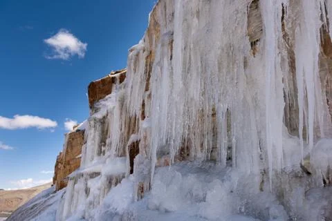 Icicles on a mountain side Stock Photos