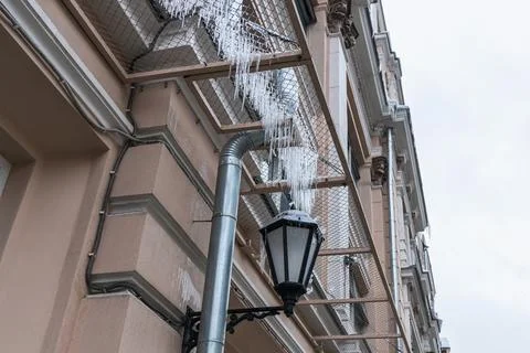 Icicles on the office building Stock Photos