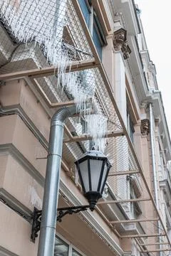 Icicles on the office building Stock Photos