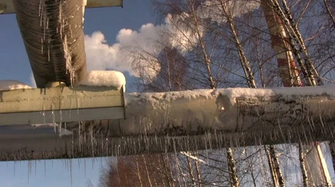 Icicles on power electric station pipes 2 Stock Footage