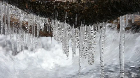Icicles on River Stock Footage 46592371