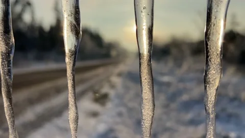 Icicles on a road sign. Stock Footage 233081390