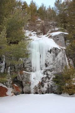 Icicles on a rock face Fotos de archivo