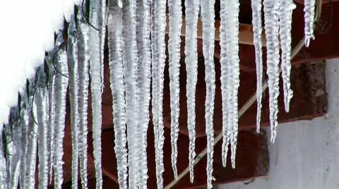 Icicles On a Roof Stock Footage 10685384