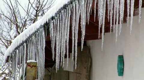 Icicles On a Roof Stock Footage 10685414