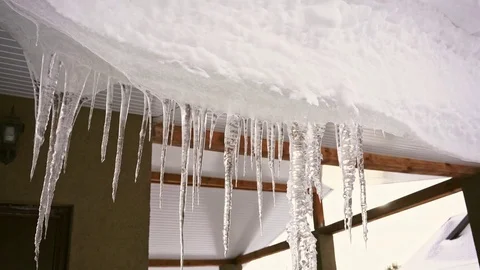 Icicles on the roof Stock Footage 83633446