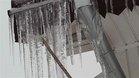 Icicles on the roof Stock Footage 97639095
