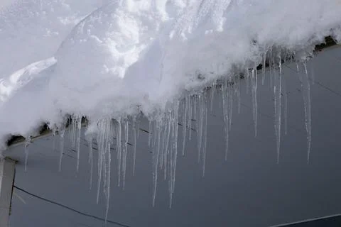 Icicles stone wall Stock Photos