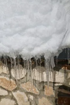 Icicles stone wall Foto stock