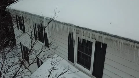 Icicles on Suburban Home Stock Footage 144623129