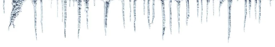 Icicles which are hanging down from a roof Stock Photos