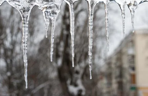 Icicles which are hanging down Stock Photos