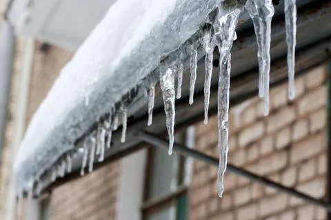 Icicles which are hanging down Stock Photos