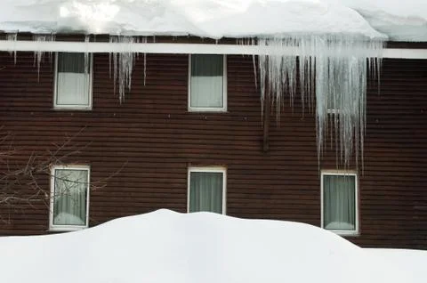 Icicles on window Stock Photos