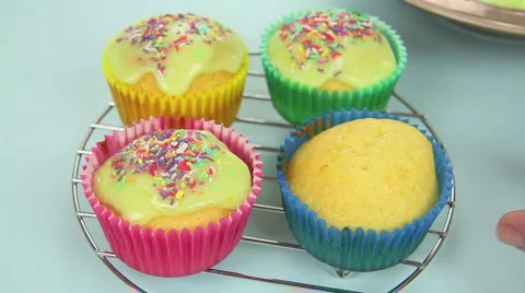 Icing Four Cup Cakes Stock Footage