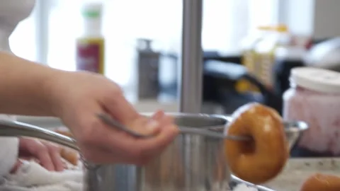 Icing the prepared donuts Stock Footage 307339987