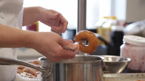 Icing the prepared donuts Stock-Footage 307339988