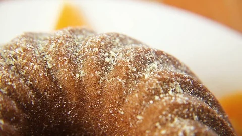 Icing sugar being sprinkled on cake Video stock 76099759