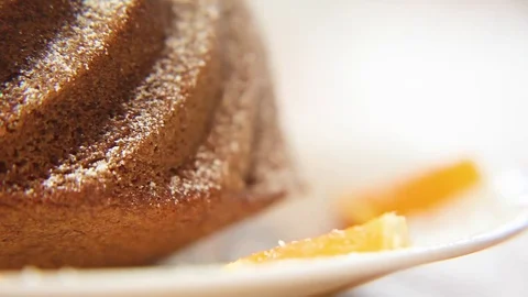 Icing sugar being sprinkled on cake Video stock 76099802