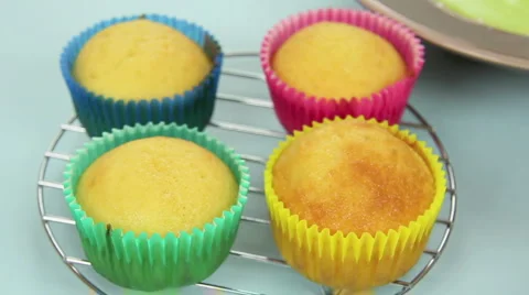 Icing Yellow Cup Cake Stock Footage 1218248