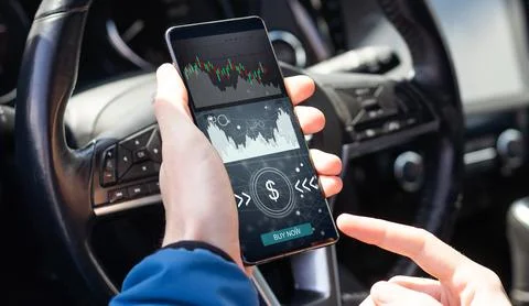 ICO concept - hand clicks on smartphone with abstract graphics. Stock Photos