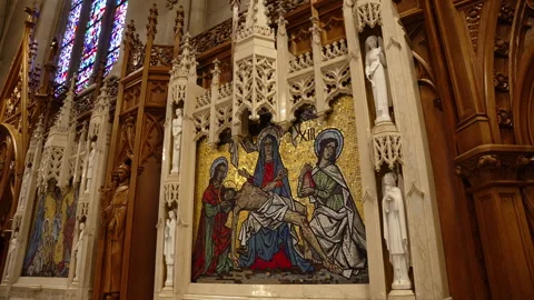 Icon with the image of saints in St. Patrick's Cathedral, Midtown Manhattan New Stock Footage 246076018