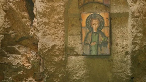Icon on wall above Proval lake in cave. Sightseeing in pyatigorsk Stock Footage 101724758