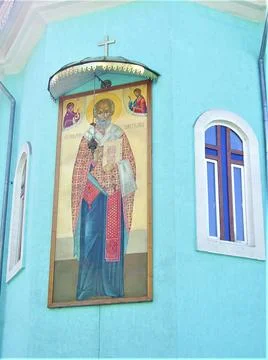 Icon on the wall of the cathedral  Stock Photos