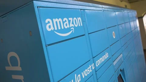 The iconic Amazon logo on a blue locker, a convenient and contactless station Stock Footage 320111557