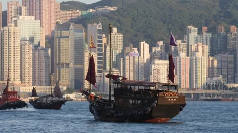 Iconic Aqua Luna Red-Sail Chinese Junk Boat in Victoria Harbour Stock Footage 334435009