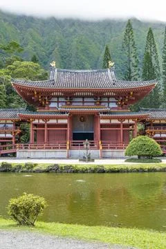 Iconic architecture at Byodo-In Temple featuring tiered roofs and oriental .. Stock Photos