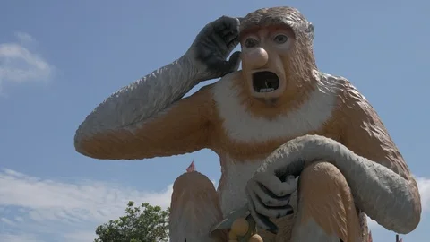 Iconic Bekantan or Nose Monkey statue, daytime view. 4K Ultra HD Stock Footage 105550436