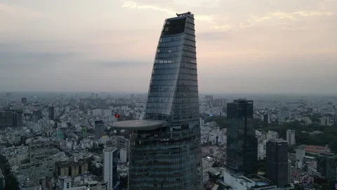 Iconic Bitexco Financial Tower Standing Above Ho Chi Minh City, Vietnam Video stock 335619989
