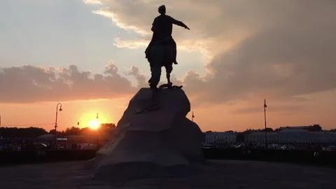 Iconic Bronze Horseman statue of Peter the Great silhouetted against a dram.. Stock Footage 323972829