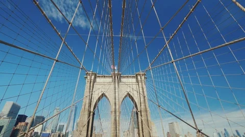 Iconic brooklyn bridge cables and towers against a clear blue sky, with new.. Stock Footage 335052845