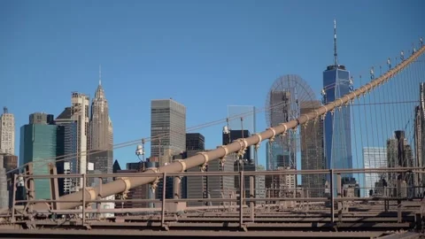 The iconic Brooklyn Bridge overlooking the impressive Downtown Manhattan Skyline Stock Footage 294957338