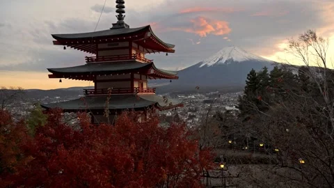 Iconic Chureito Pagoda and Mount Fuji during a beautiful dreamy sunset in Japan Stock Footage 335899793