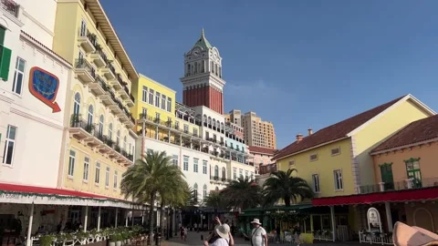 Iconic Clock Tower and Mediterranean Architecture in Sunset Town Plaza Phu Quoc 스톡 동영상 337200122