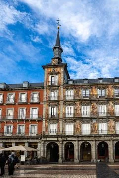 Iconic clock tower and painted facade of the historic bakery building in Madr Stock Photos