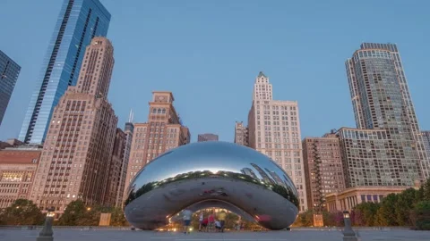 The iconic Cloud Gate sculpture known as The Bean in Millennium Park 4K Video stock 334458383