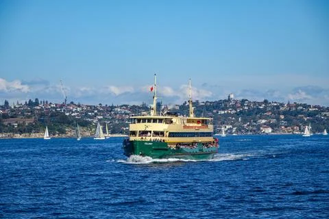 The iconic Collaroy ferry full of passengers cruises across Sydney Harbour .. Stock Photos