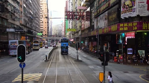  iconic double-decker tram bus on the street downtown Hong Kong, China Stock Footage 88721529