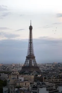 Iconic Eiffel Tower at sunset. Paris, France Stock Photos