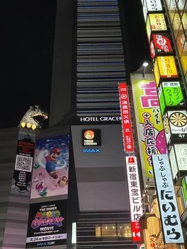 Iconic Godzilla head statue perched atop the Hotel Gracery Stock Photos