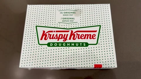 Iconic Krispy Kreme Donut Box, Sweet Fast Food Dessert Packaging⁠ Video stock 337125625