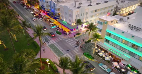 Iconic palm lined Ocean Drive at night in Miami Beach. A must visit Florida Stock Footage 311750875