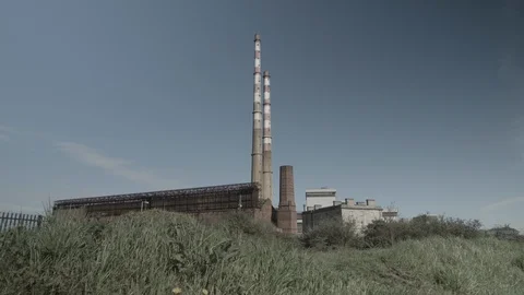 Iconic red and white Poolbeg chimney stacks in Dublin Stock Footage 99358185