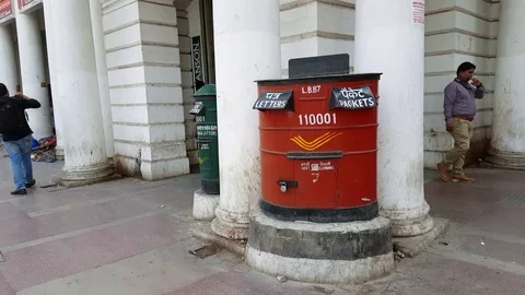 Iconic red post office box for letters and packets, parcels, New Delhi, India Stock Footage 72339478