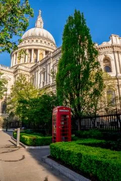 Iconic Red Telephone Booth in St Paul's Cathedral churchyard in central Londo Stock Photos