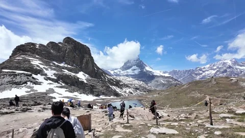 Iconic Reflection of Matterhorn Mountain in Riffelsee Lake, Zermatt, Switze.. Stock Footage 343593468